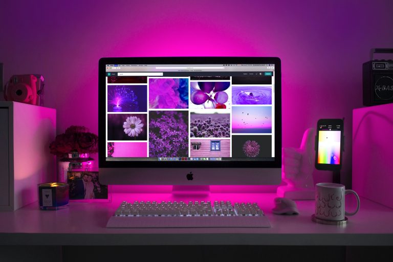 silver-imac-displaying-collage-photos-1779487